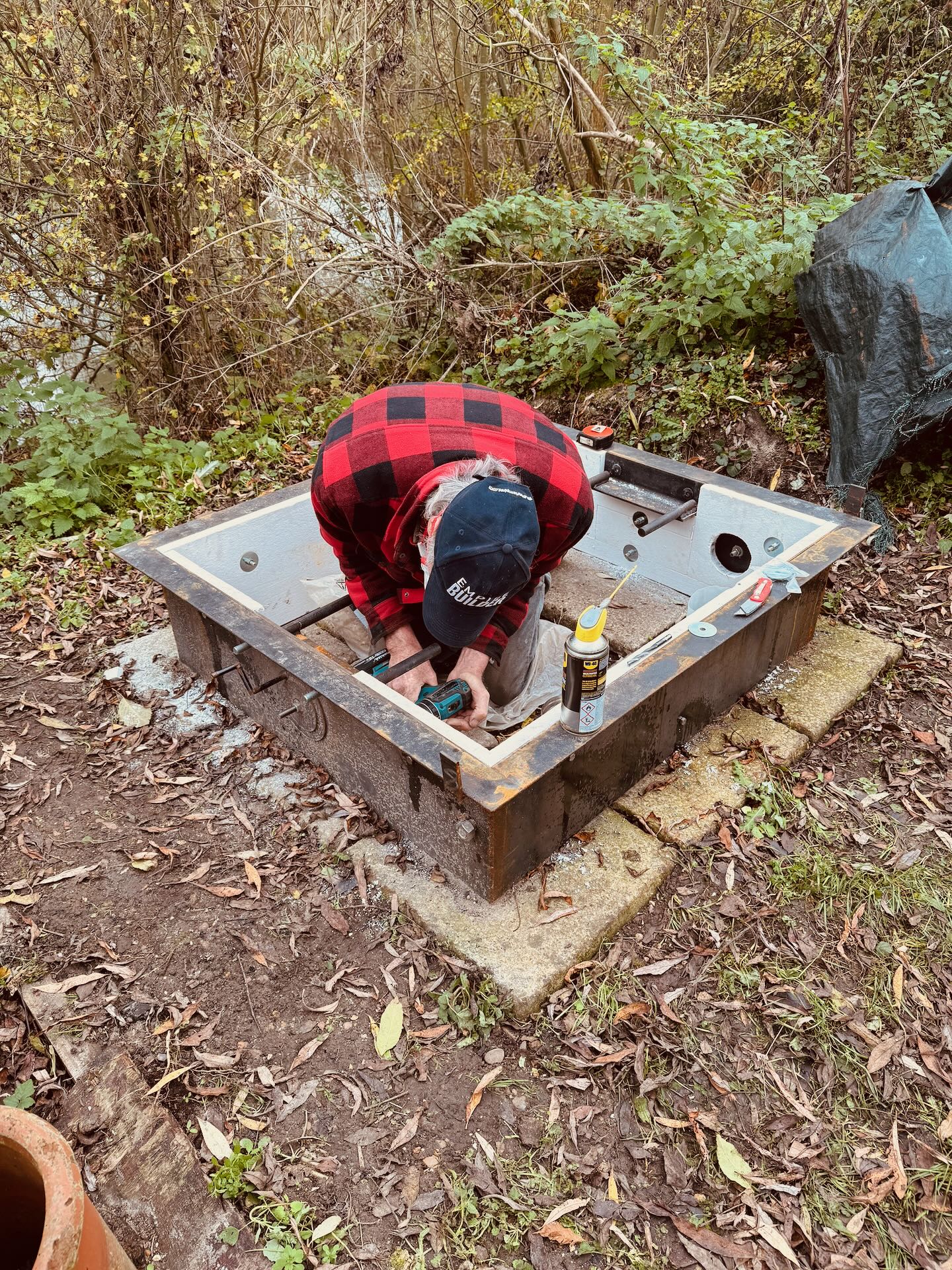 Val fitting the firebox seals on the retort kiln